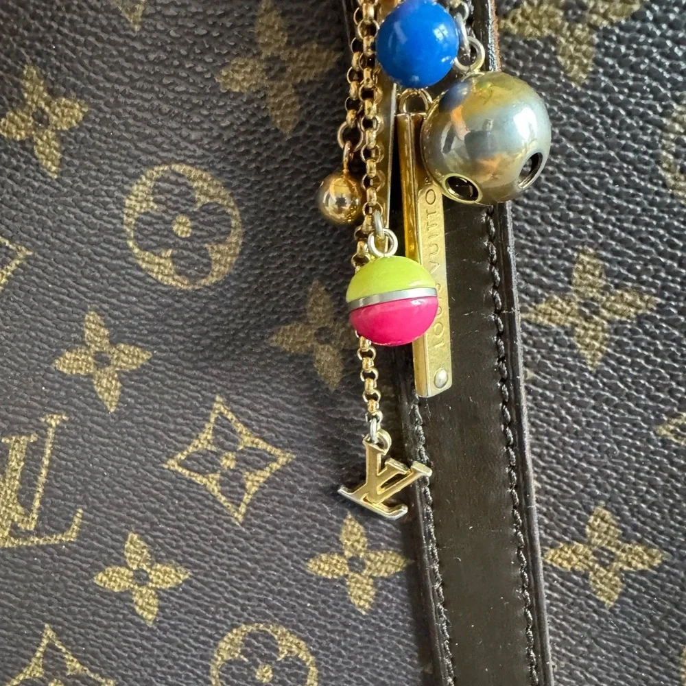 Authentic Louis Vuitton Porte Cles grelots bag charm and key holder